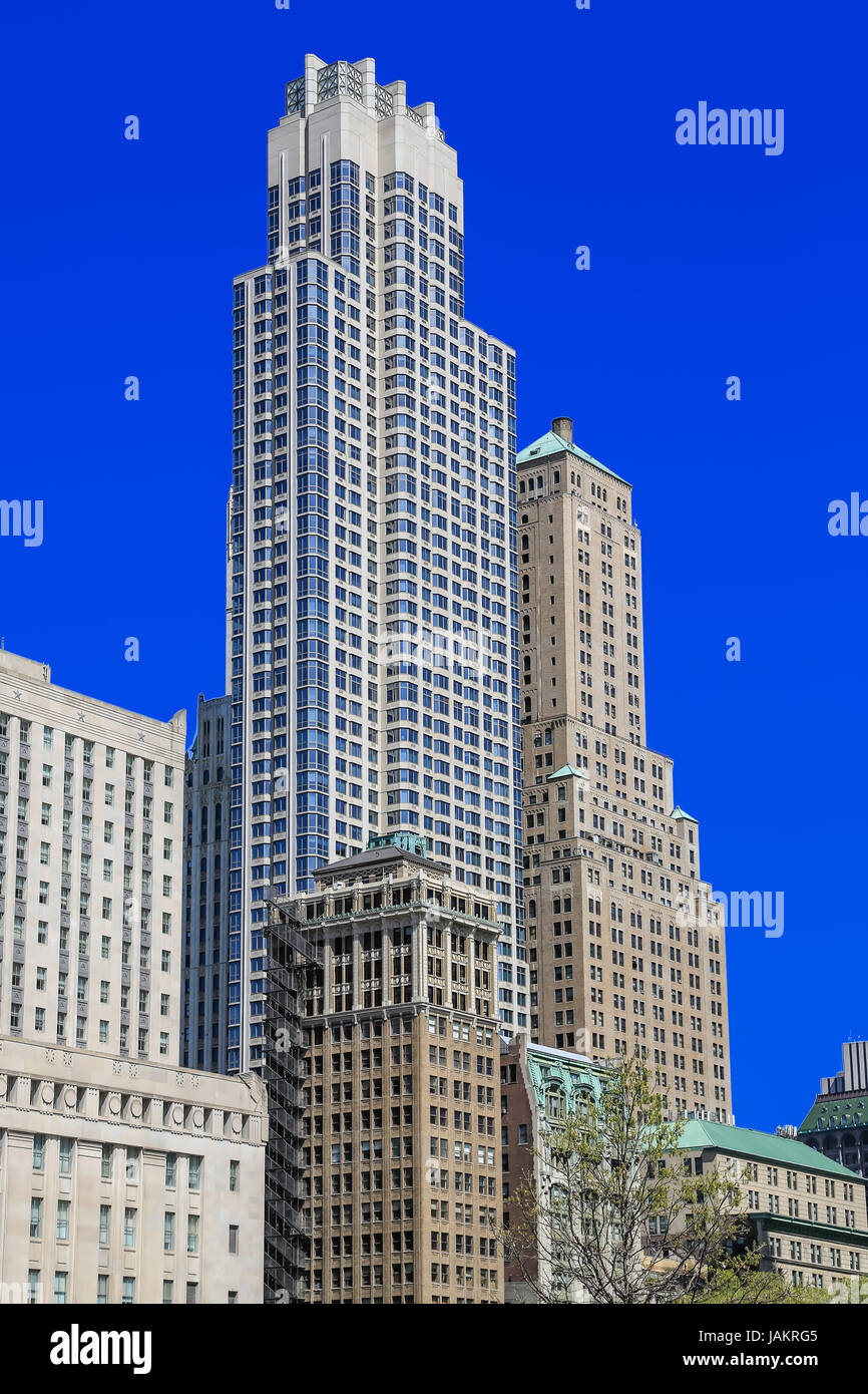 Skyscraper with blue sky in New York City Stock Photo - Alamy