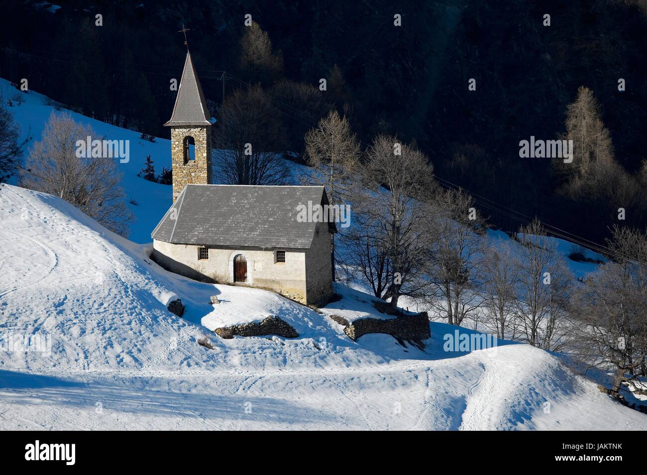 Small church in a snowy landscape Stock Photo - Alamy