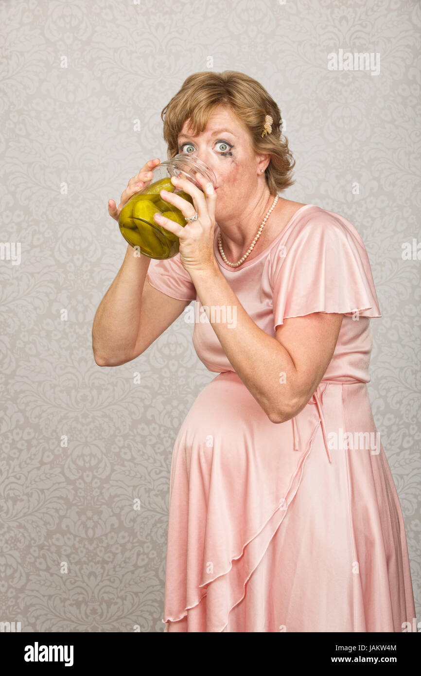Ashamed Pregnant Woman Drinking Vinegar From Pickle Jar Stock Photo Alamy