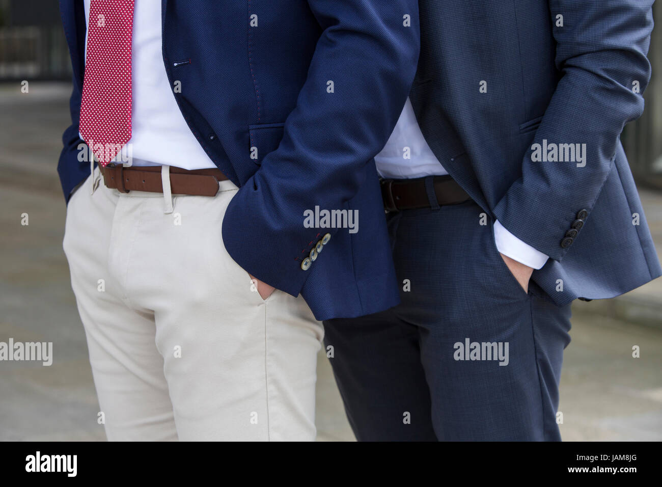 closeup of two businessmen standing next to each other Stock Photo - Alamy