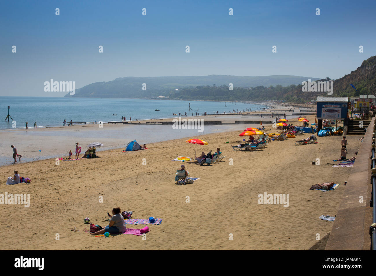 General view of the busy beach at Sandown, Isle of Wight, on a sunny summer day. Stock Photo