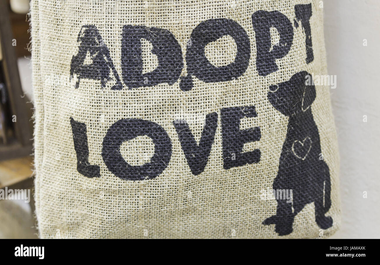 Animal Adoption sign on wicker background, love and nature Stock Photo