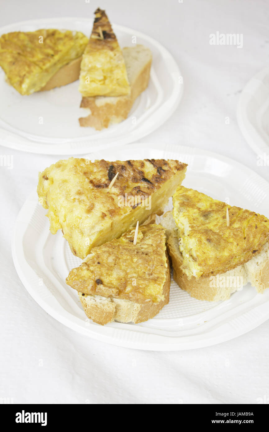 Spanish potato omelette with bread in food, food market Stock Photo