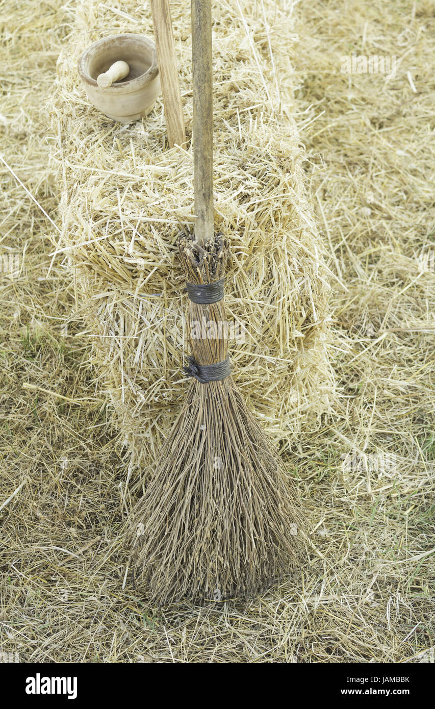 Broom with straw bale in barn farm, agriculture Stock Photo Alamy