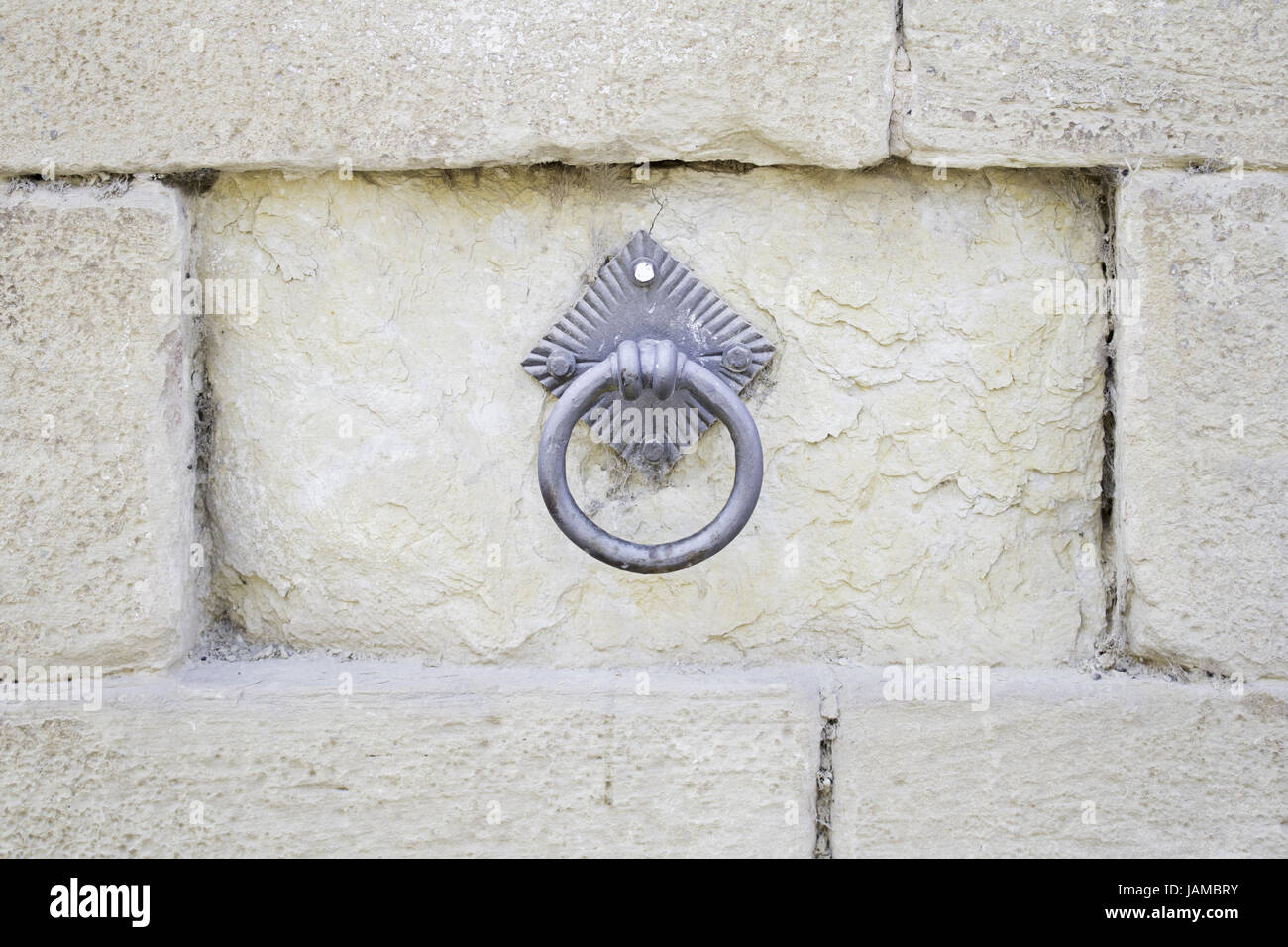 Rusty knob granite stone building structure, building Stock Photo