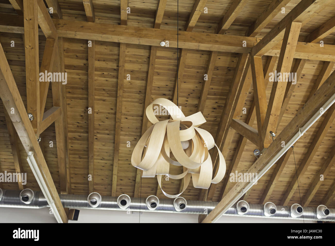 Celebration with paper lamp hanging on wooden roof construction Stock Photo  - Alamy