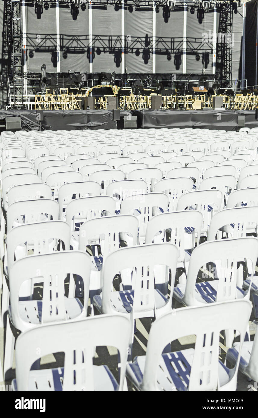 Chairs in concert with empty stage, celebration and event Stock Photo