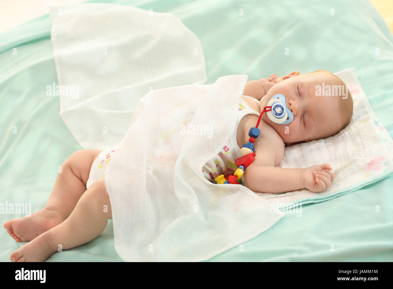 Baby girl with dummy hi-res stock photography and images - Alamy