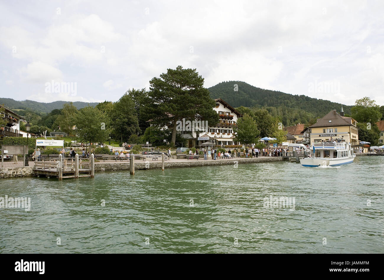 Germany,Upper Bavaria,Tegernsee,landing stage,excursion boat,tourist,no model release,Bavarians,place,health resort,resort,jetty,lake,residential house,farmhouse,inn,lock cafe,cafe,gastronomy,destination,excursion,boat,tourism,person, Stock Photo