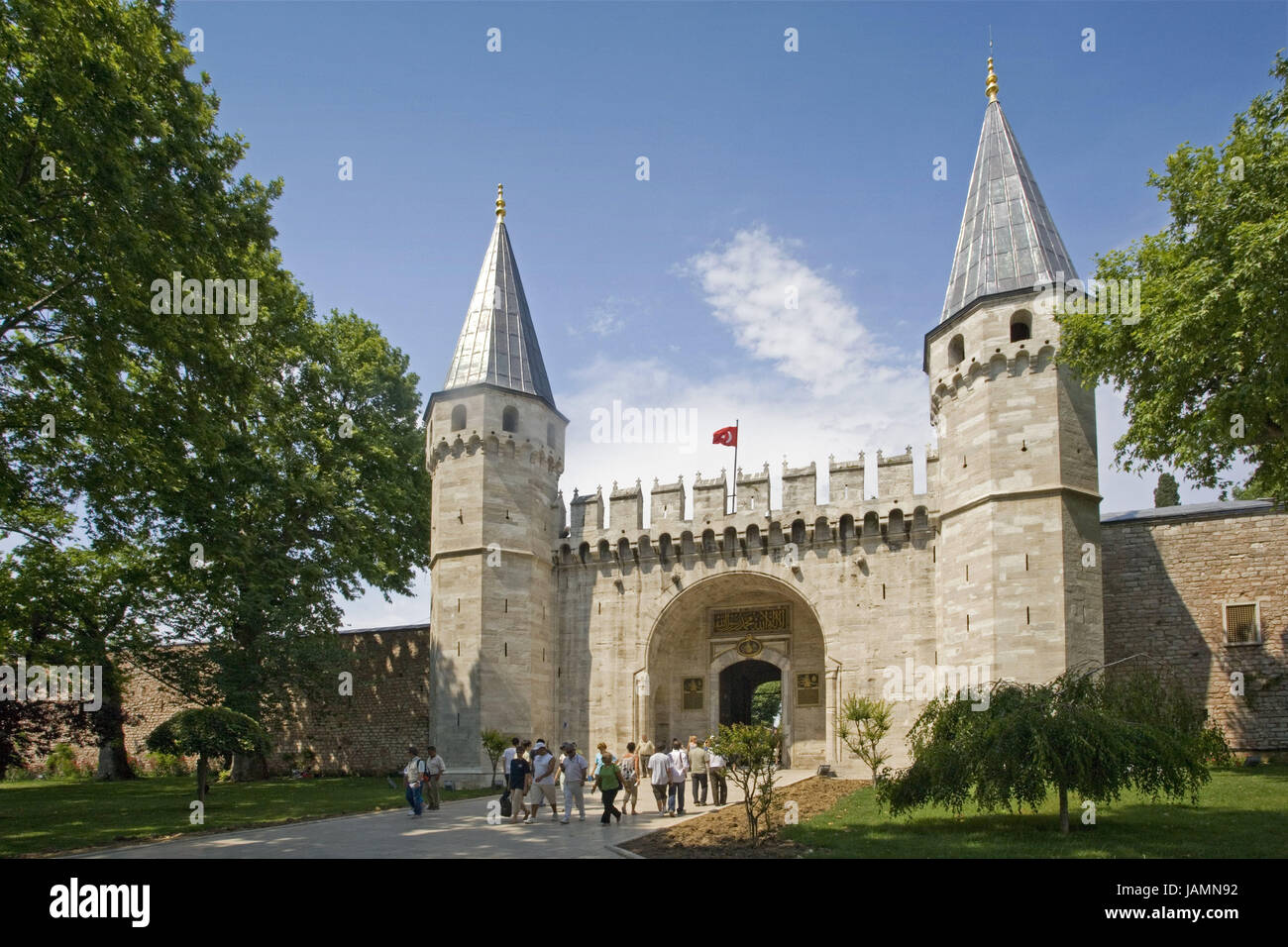 Turkey,Istanbul,Topkapi palace,gate,tourist,no model release,town,city,metropolis,port,culture,input,gate,place of interest,person,tourism,towers,architecture,museum,palace building,defensive wall,palace defensive wall,outside, Stock Photo