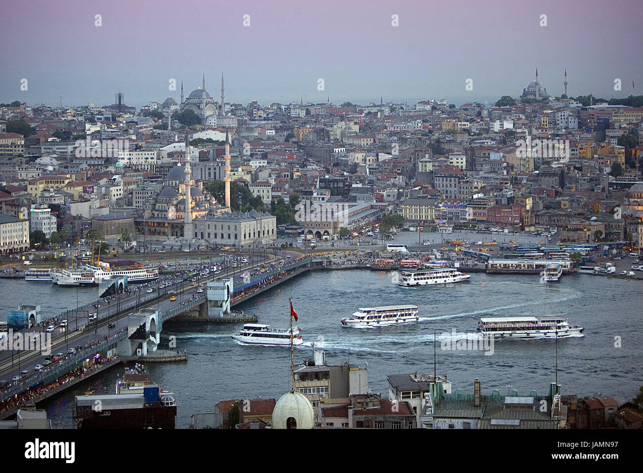 Turkey,Istanbul,town view,'the Golden Horn',Galata bridge,ships,dusk,town,city,metropolis,port,culture,place of interest,tourism,architecture,the Bosporus,sea,navigation,holiday ships,towers,minarets,mosque,domes,dusk,evening, Stock Photo