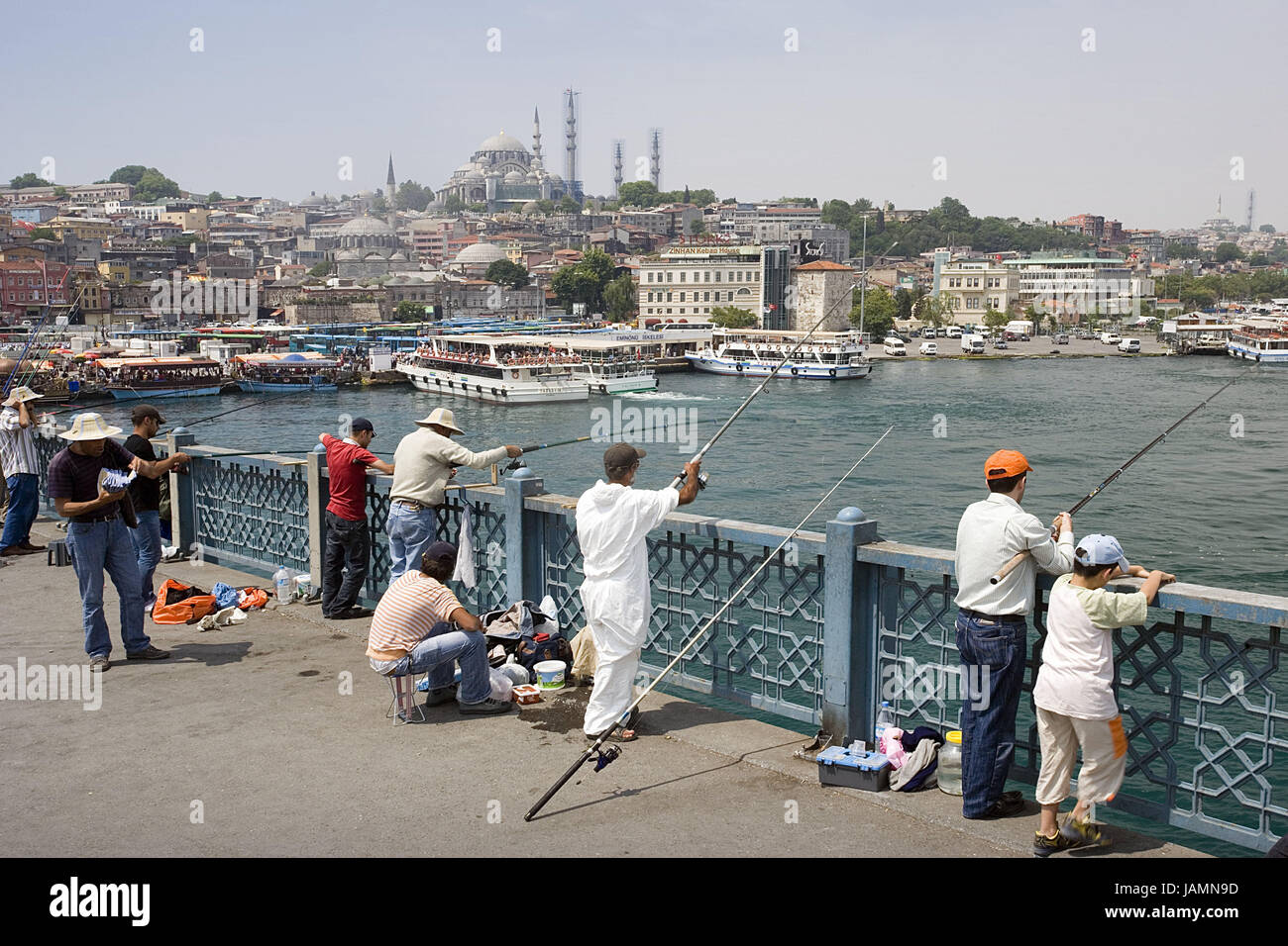 Turkey,Istanbul,town view,'the Golden Horn',Galata bridge,fisherman,no model release,town,city,metropolis,port,culture,place of interest,tourism,architecture,the Bosporus,sea,navigation,holiday ships,ships,towers,minarets,mosque,person,men,children,hinge,catch, Stock Photo