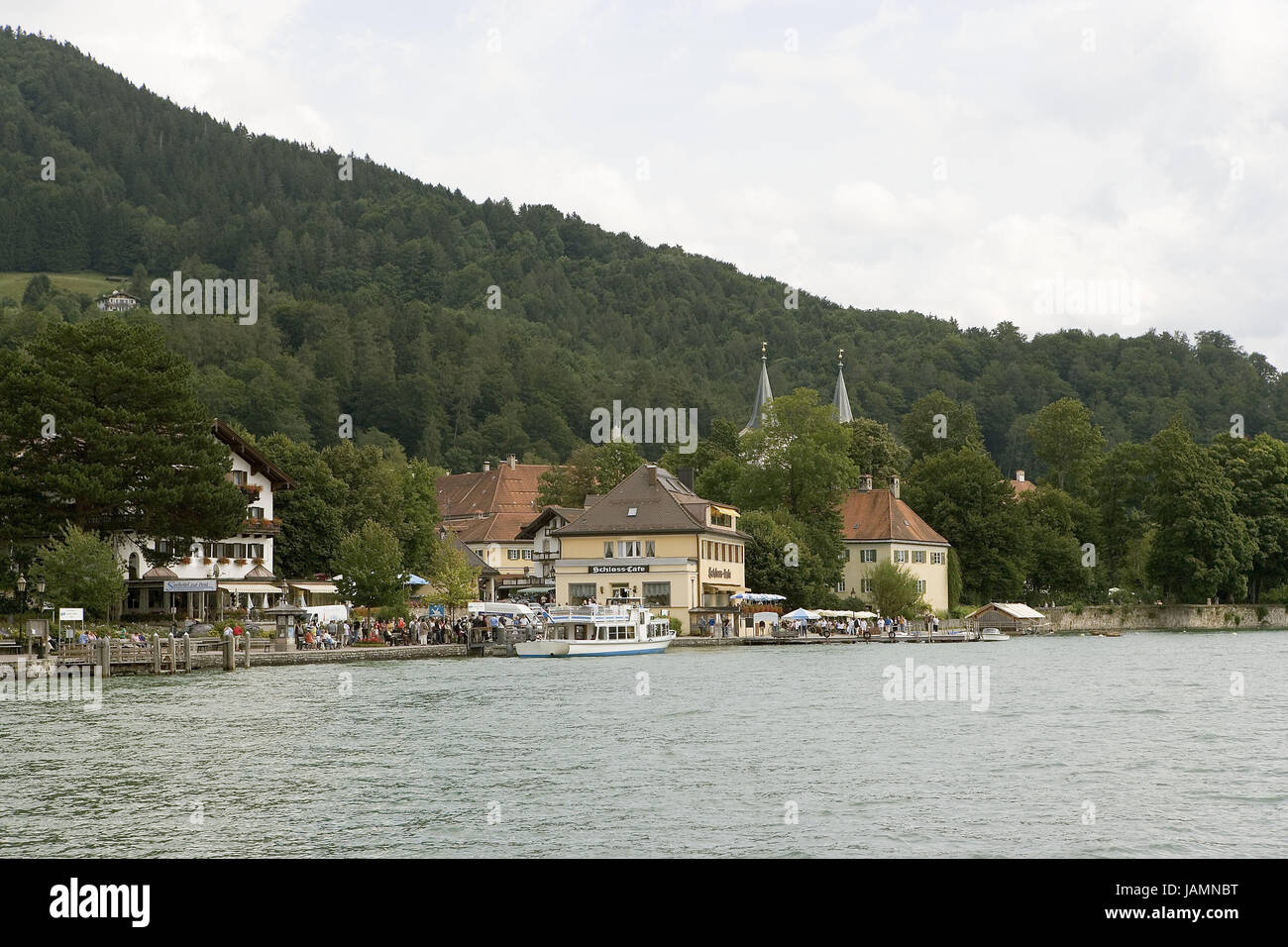 Germany,Upper Bavaria,Tegernsee,excursion boat,cafe,Bavaria,place,health resort,resort,lake,houses,residential houses,cloister,basilica,steeples,inn,lock cafe,gastronomy,destination,excursion,boat,tourism,tourist,person,trees,wood, Stock Photo