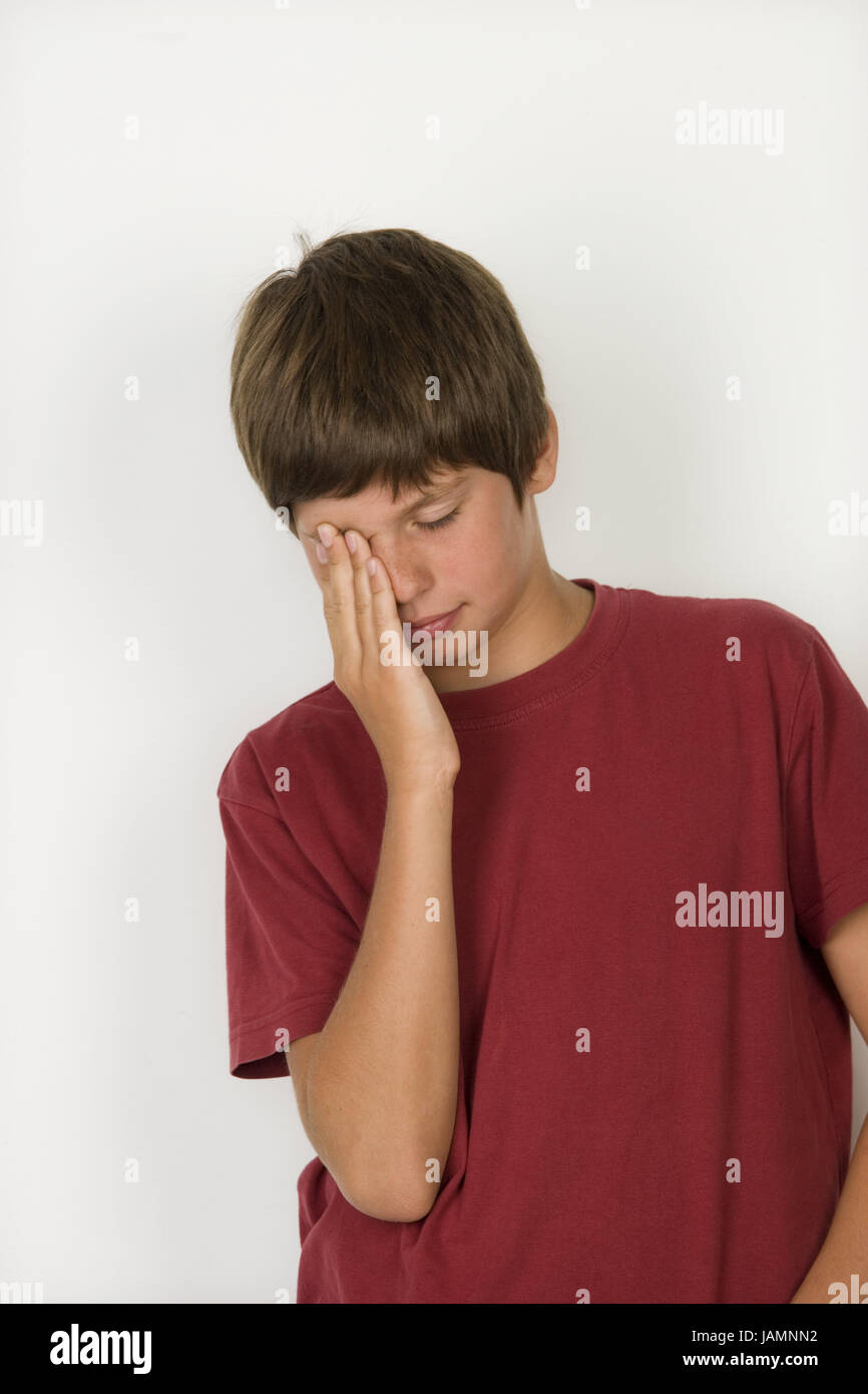 Boy,brown-haired,portrait,studio,tiredly,teenagers,dark-haired,young person,T-shirt,red,youth,brown,hand,look,ocular pains,depletion,inside,rub,eyes,fatigue,pains,overfatigue,sadly,suppressed,unhappily,cry, Stock Photo