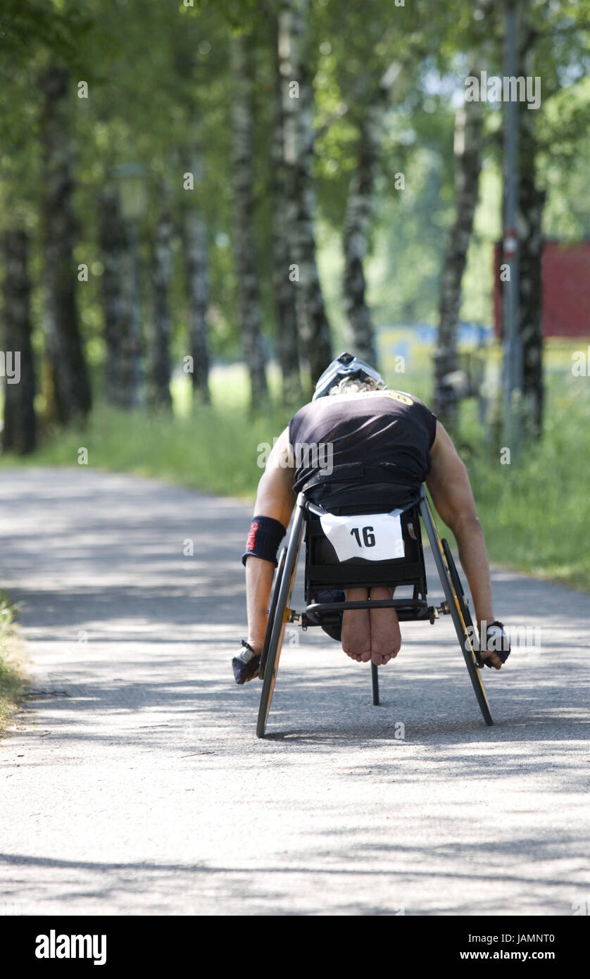 Handicapped sport,marathon,invalid's wheel chair driver,back view, Stock Photo