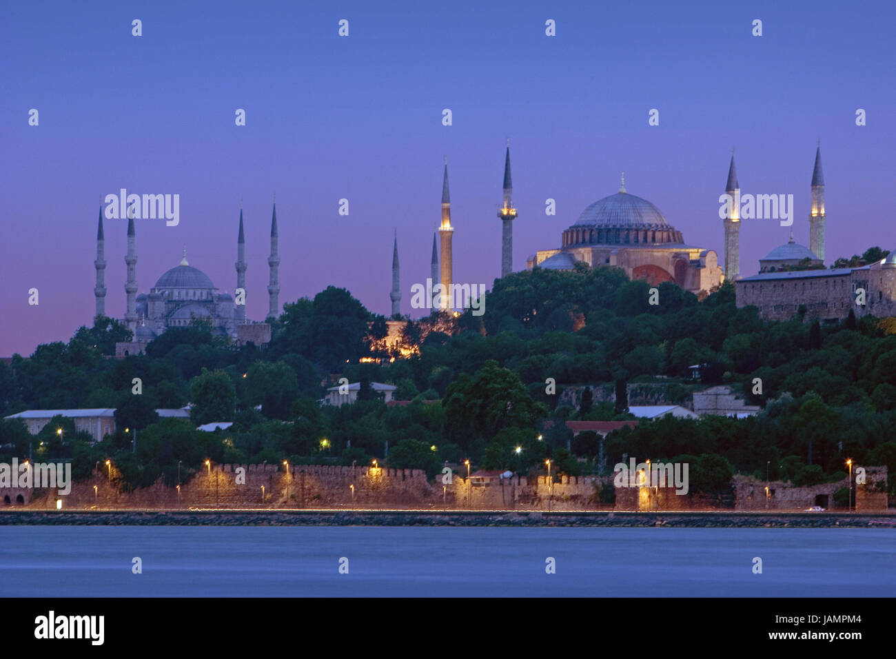 Turkey,Istanbul,town view,blue mosque,Hagia Sophia,lighting,evening,city,metropolis,port,culture,tourism,place of interest,structures,architecture,landmark,faith,religion,Islam,church,sacred construction,museum,dome,minarets,sea,lights,evening tuning, Stock Photo
