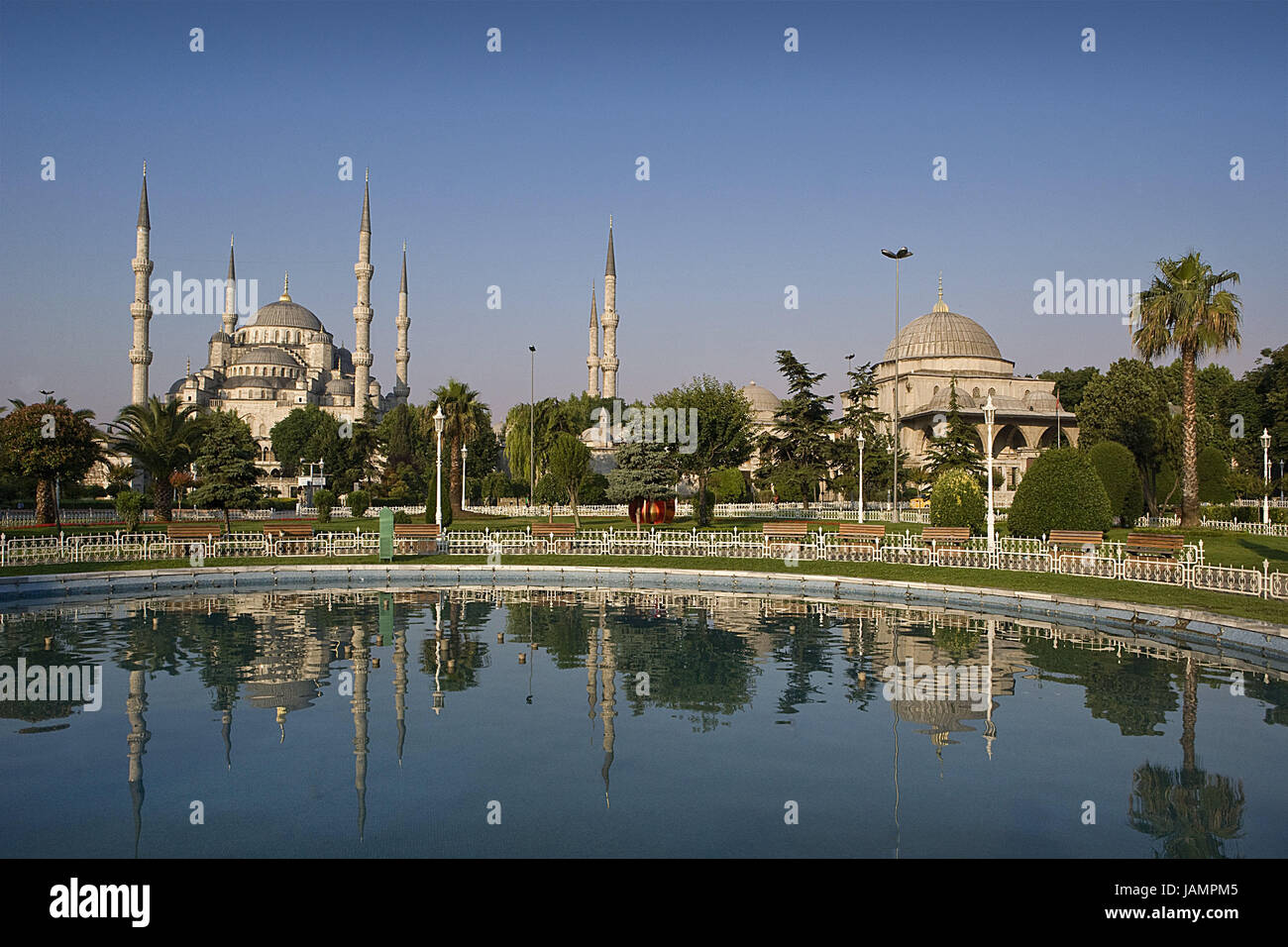 Turkey,Istanbul,sultan Ahmet Camii,'blue mosque',mirroring,water surface,town,city,metropolis,port,culture,faith,religion,Islam,structure,historically,architecture,church,sacred construction,Sultan-Ahmet-Camii,sultan's Ahmed's mosque,mosque,domed building,towers,landmarks,places of interest,minarets,domes,outside,deserted,palms,trees,water cymbals,park, Stock Photo