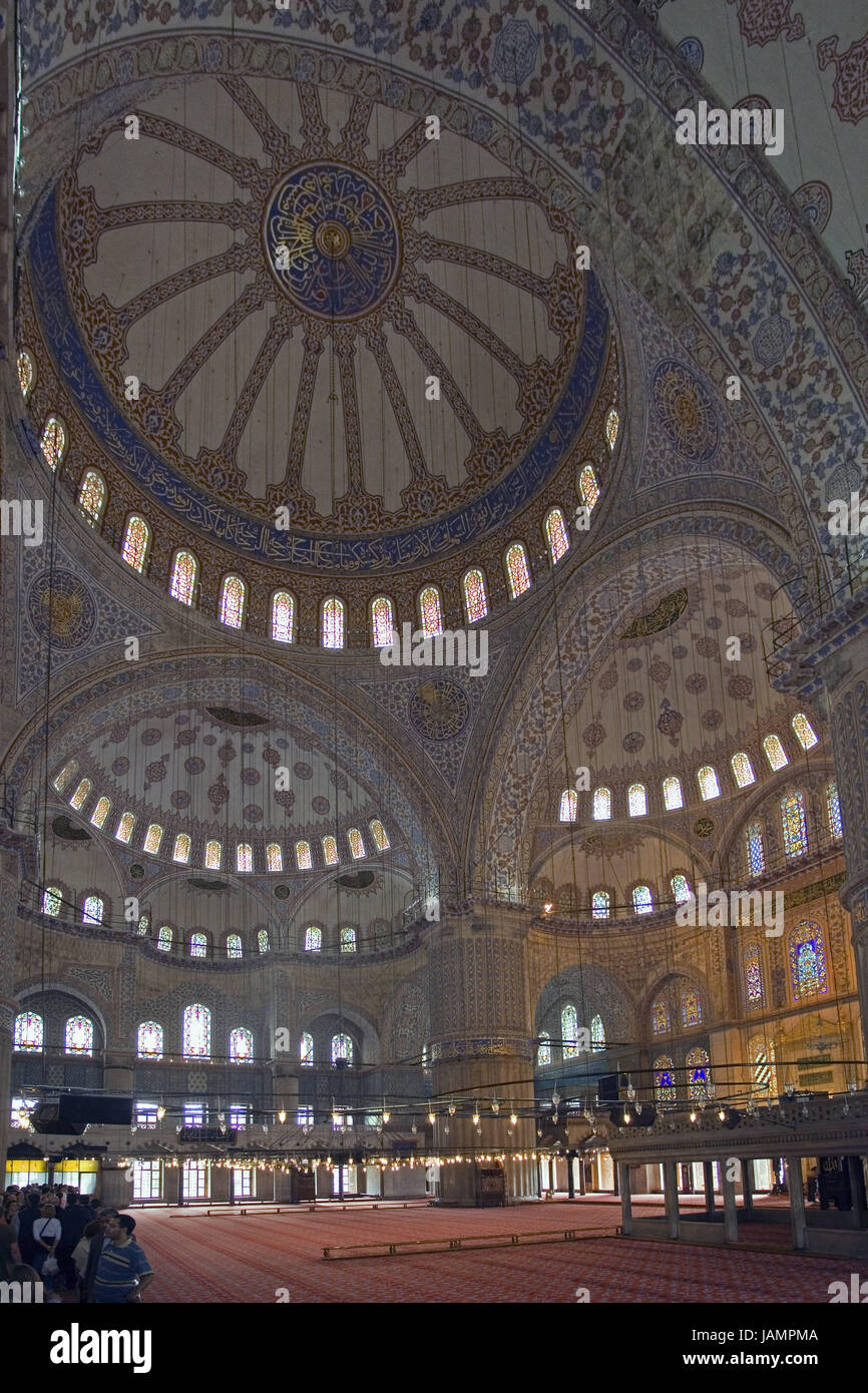 Turkey,Istanbul,sultan Ahmet Camii,'blue mosque',dome,interior shot,town,city,metropolis,port,culture,faith,religion,Islam,structure,historically,architecture,church,sacred construction,Sultan-Ahmet-Camii,sultan's Ahmed's mosque,mosque,domed building,landmark,place of interest,inside,people,visitors,curves,grace note,ornaments,tiles,lights,lamps, Stock Photo