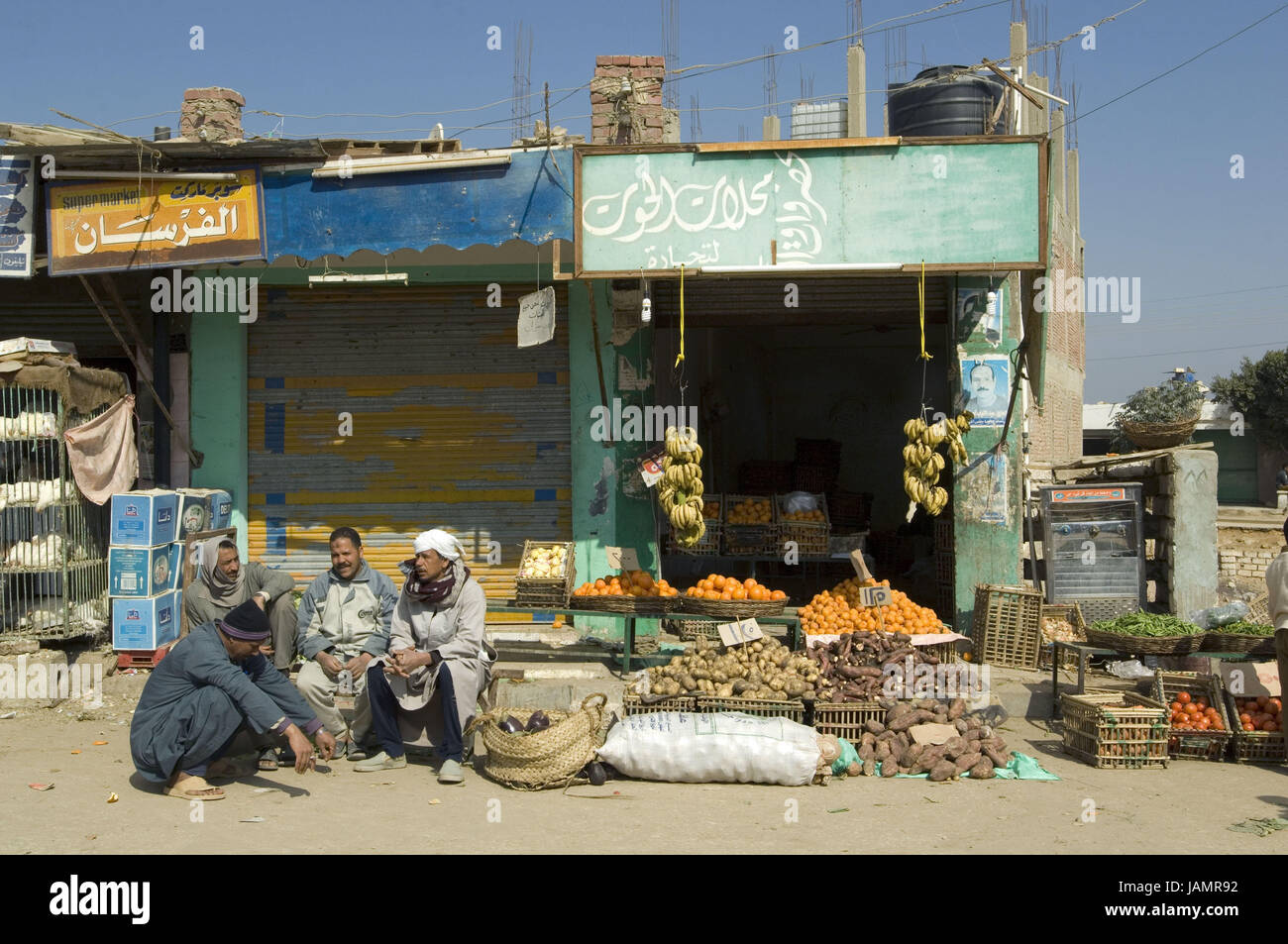 Egypt,Libyan desert,Bahareija oasis,loading,food,men, Stock Photo