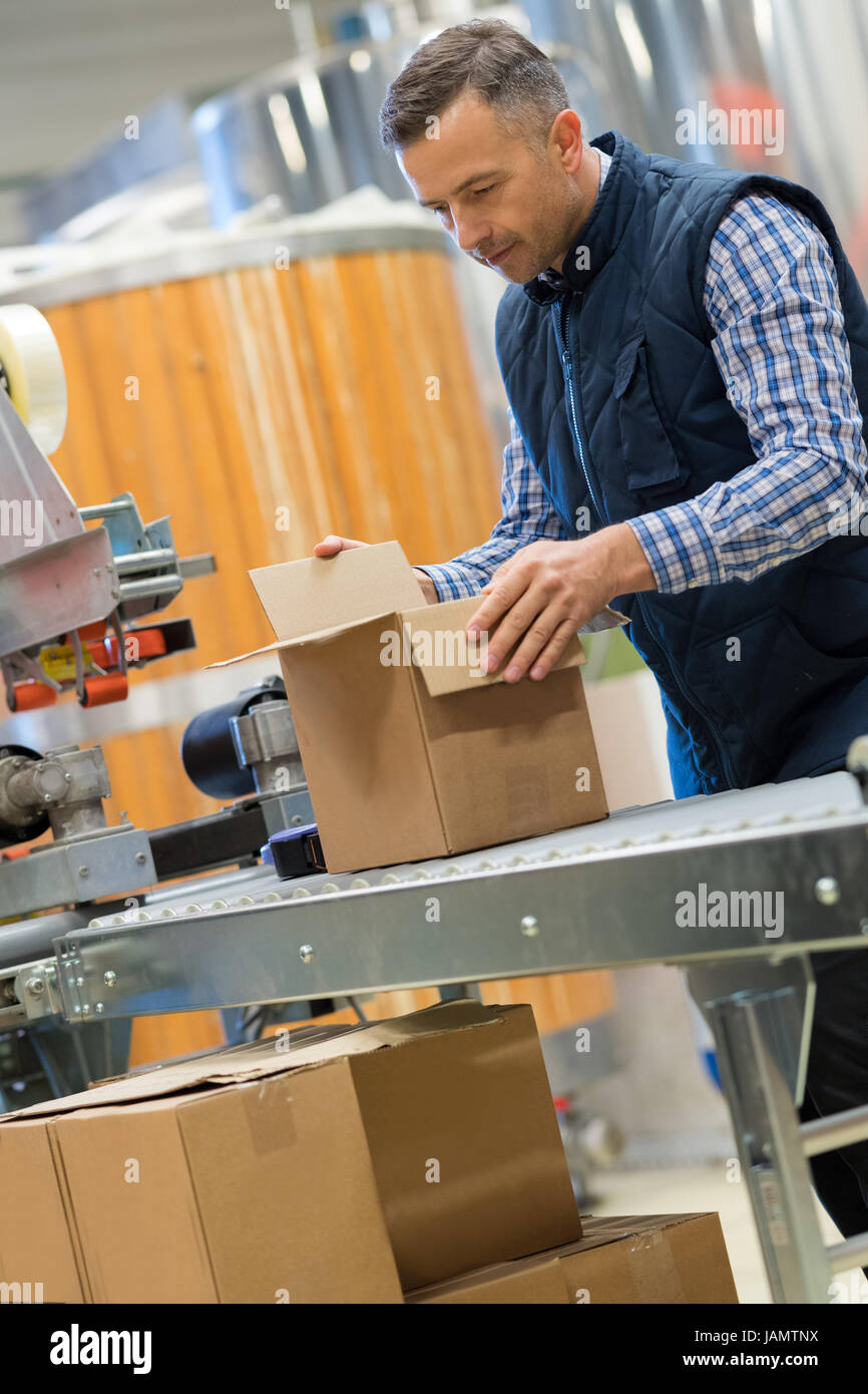 sealing the boxes Stock Photo Alamy