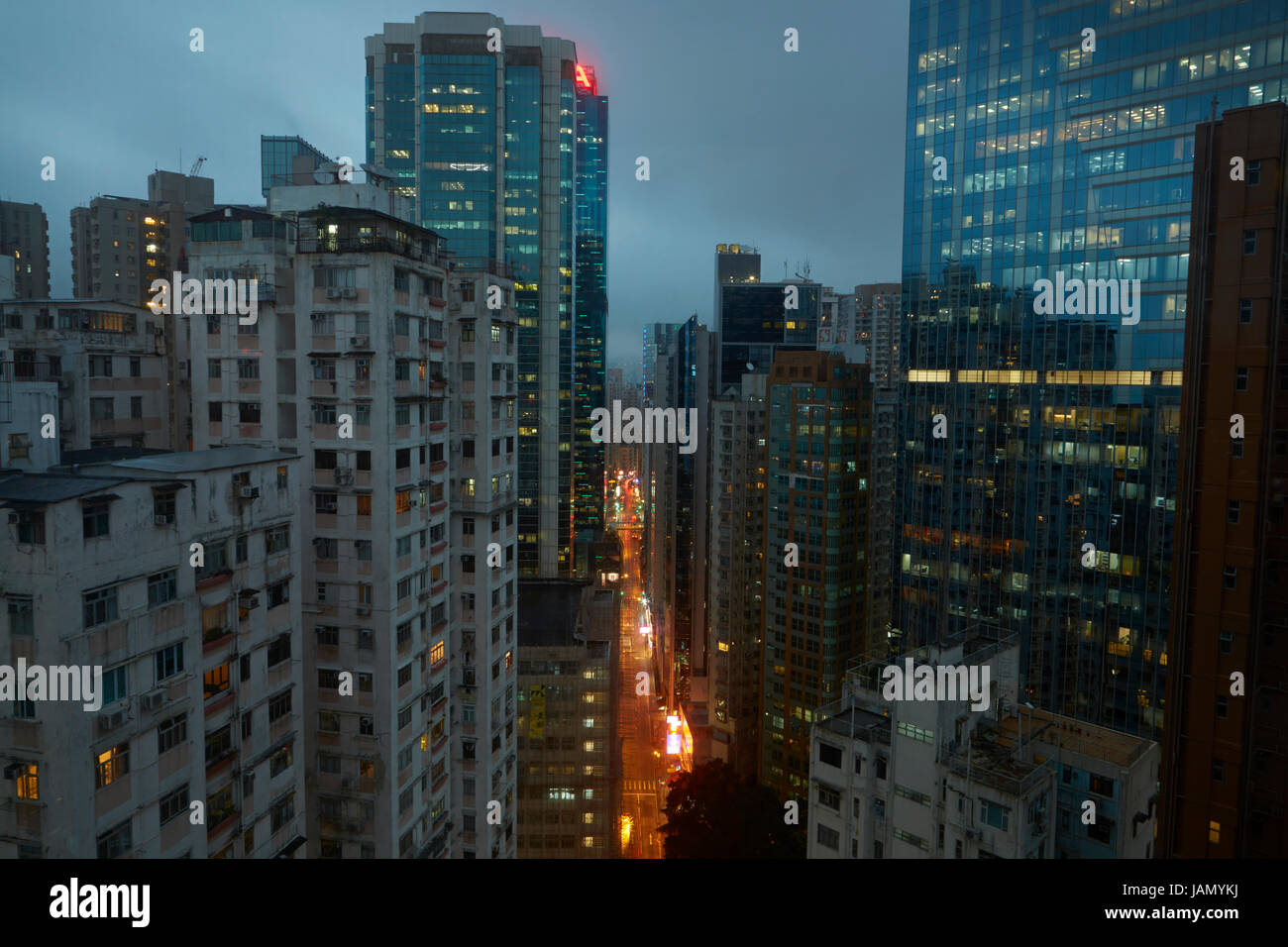 Traffic on Electric Road at night, and apartment buildings, Causeway