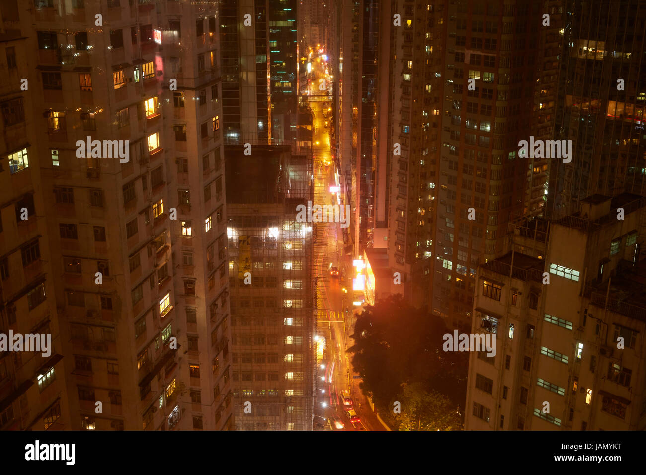 Traffic on Electric Road at night, and apartment buildings, Causeway Bay, Hong Kong, China Stock Photo