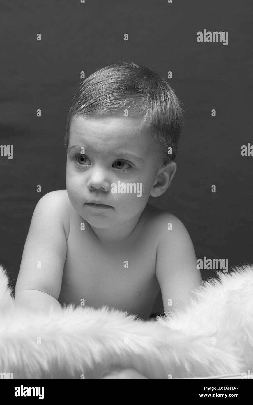 cute blonde little boy black and white Stock Photo