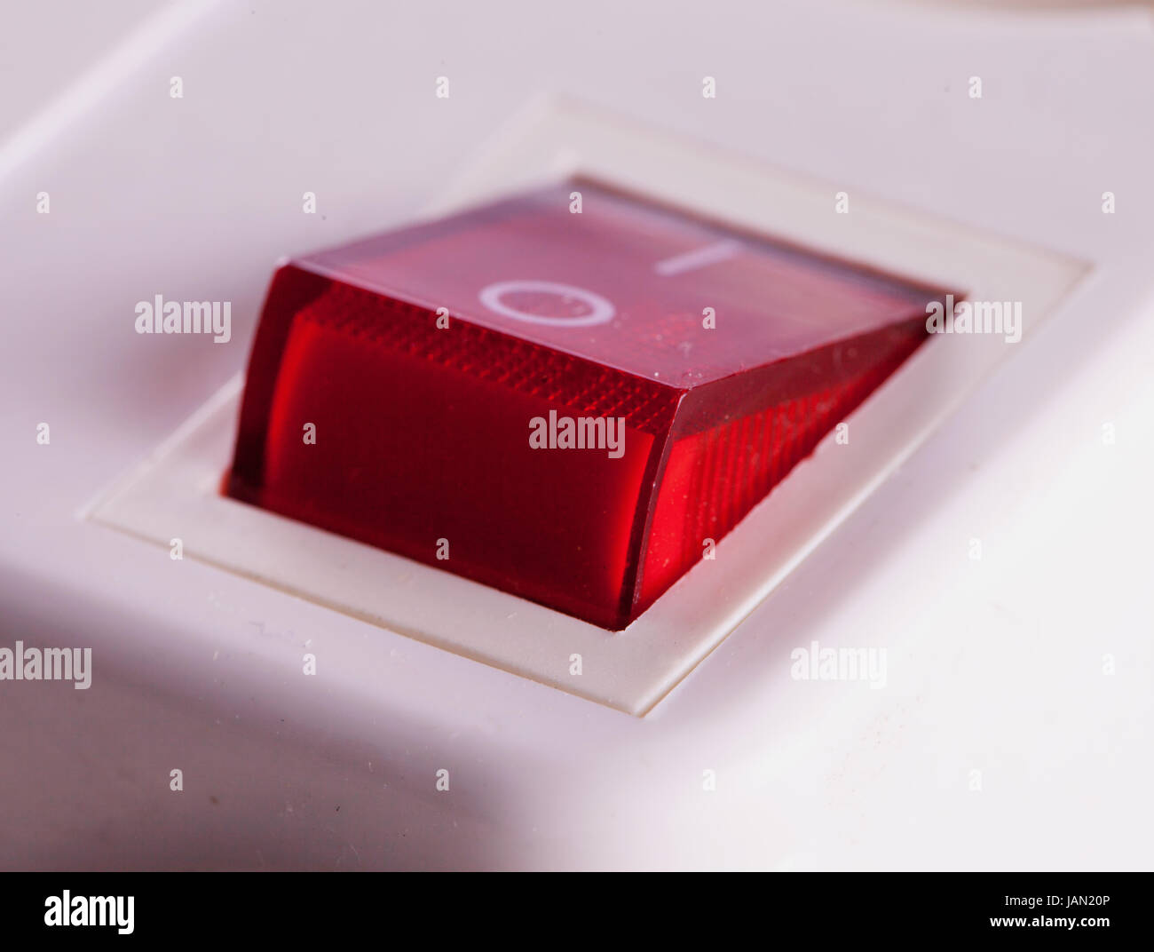 Red switch of a multiple electrical socket in closeup Stock Photo Alamy
