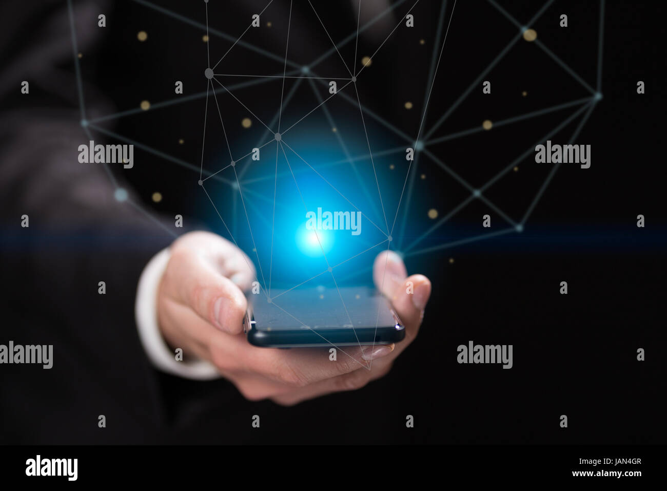 Businessman holding blue crystal ball Stock Photo - Alamy