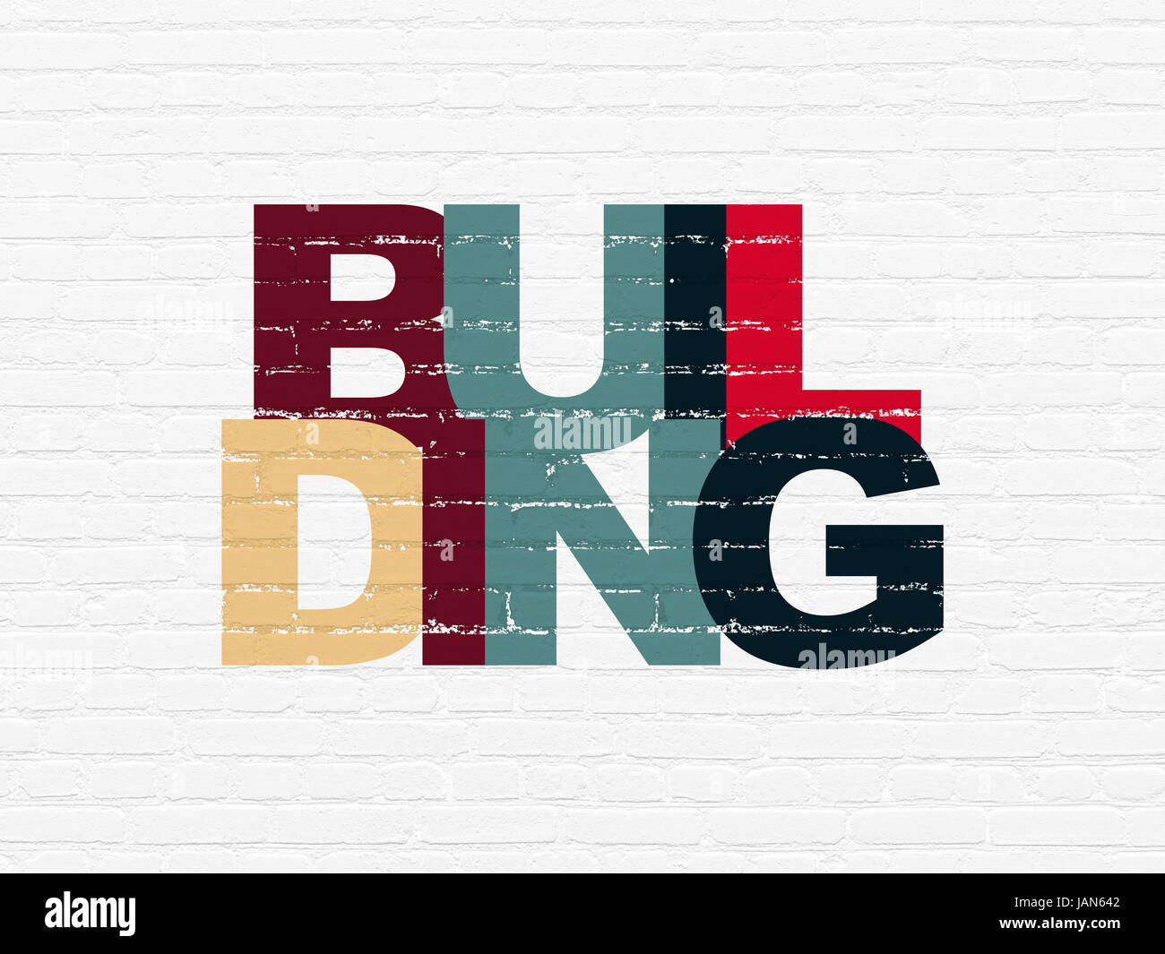 Constructing concept: Painted multicolor text Building on White Brick ...