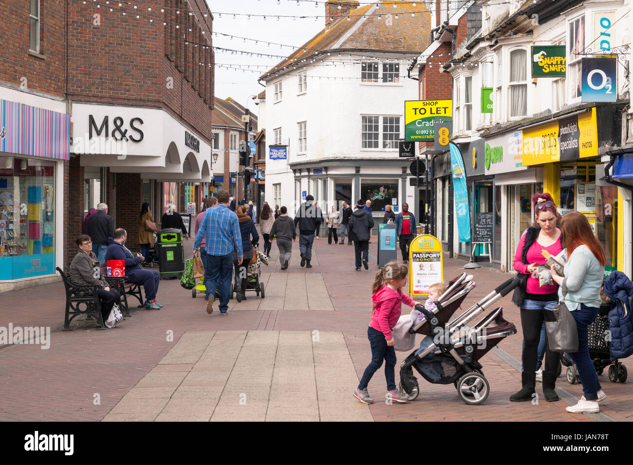 Ashford town centre people enjoying a day out shopping high street