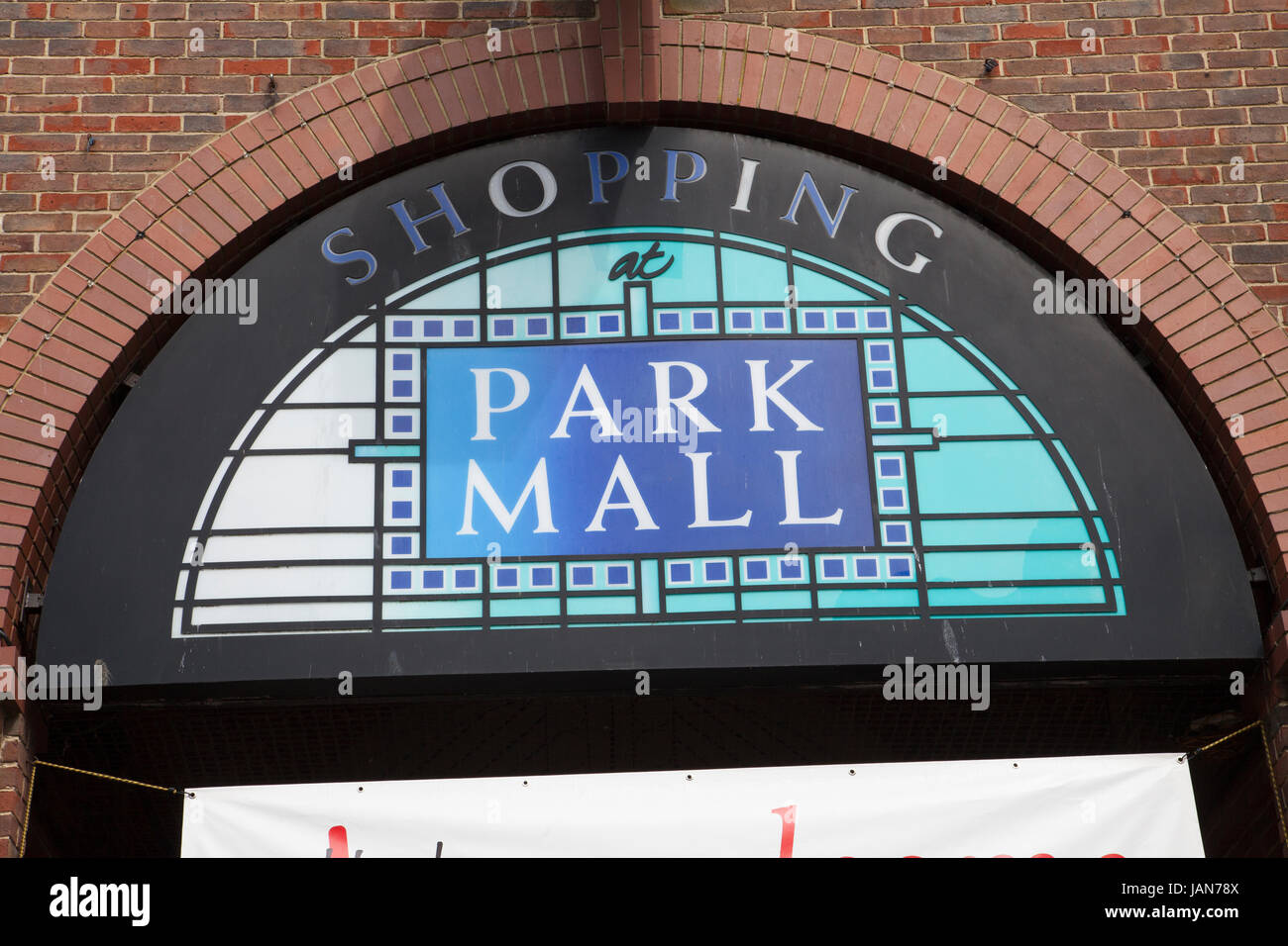 Shopping at Park Mall sign located in Ashford town centre  high street high st. Ashford, Kent Stock Photo