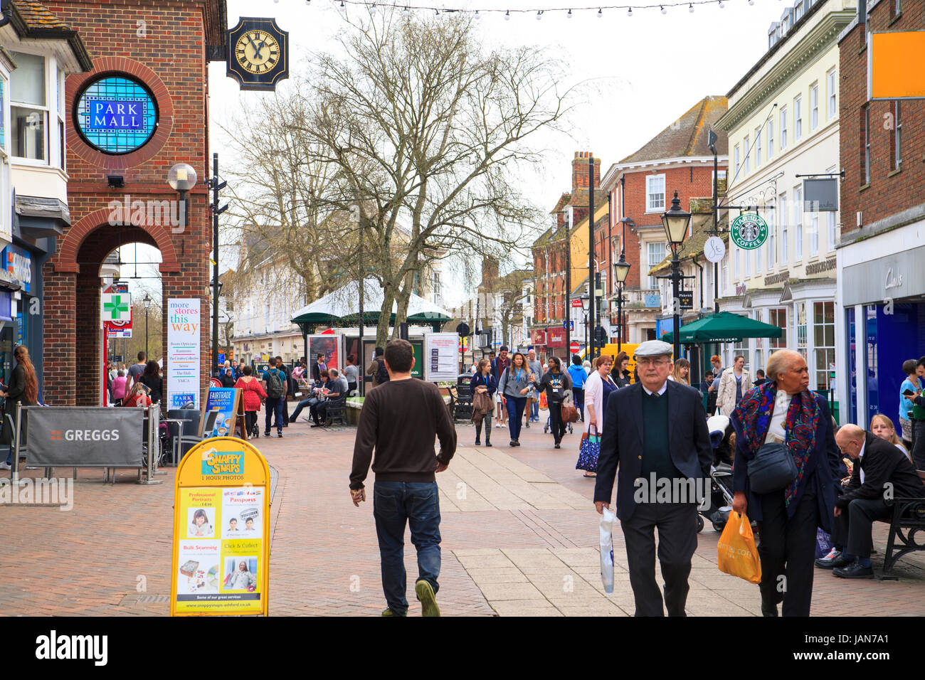 Ashford town centre people enjoying a day out shopping high street