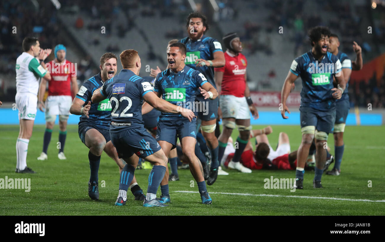 Blues' Sam Nock and Ihaia West celebrate victory at the final whistle ...
