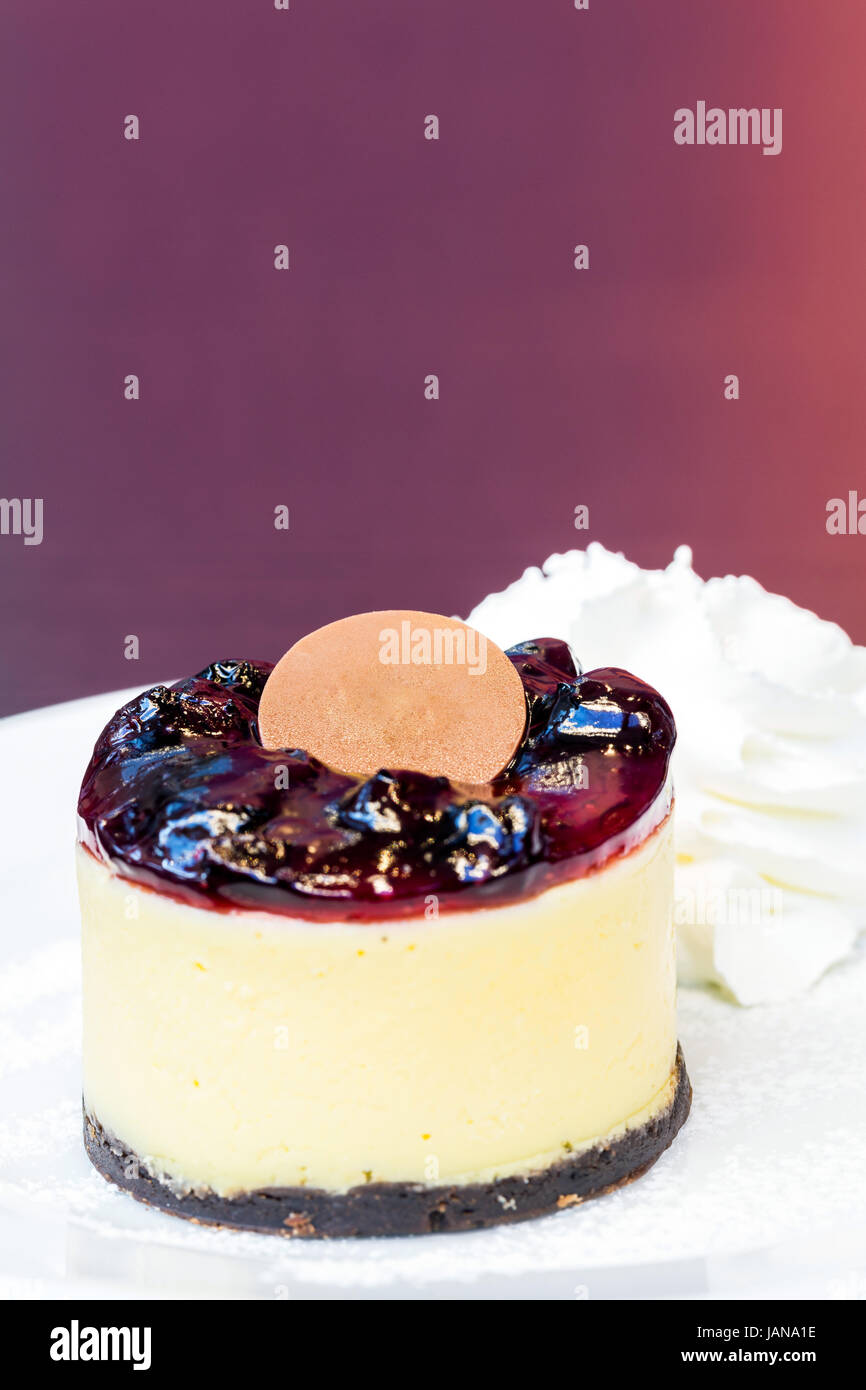 blueberry cheesecake with whipping cream Stock Photo Alamy