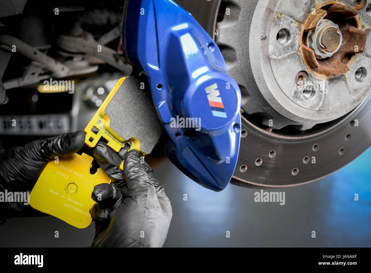 Brake change on BMW M3 to custom sports brakes Stock Photo