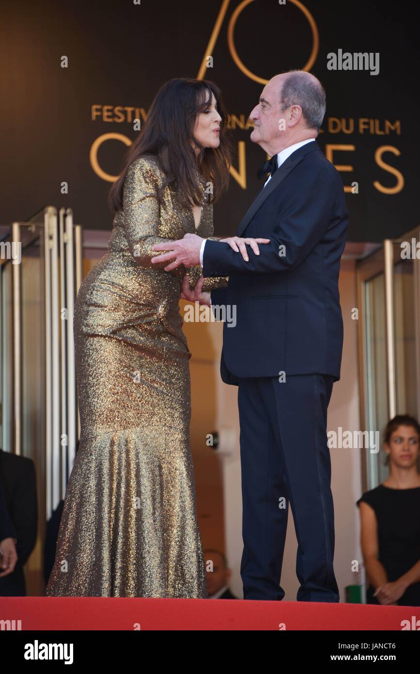 Monica Bellucci (dress by Chanel) and Pierre Lescure, President of the Festival  Arriving on the red carpet for the 70th Cannes Film Festival celebrations  May 23, 2017 Photo Jacky Godard Stock Photo