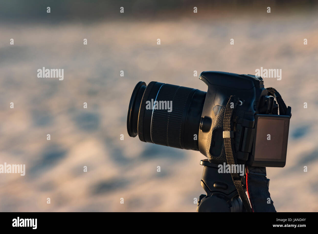 Camera on a tripod to take pictures of the sea Stock Photo - Alamy
