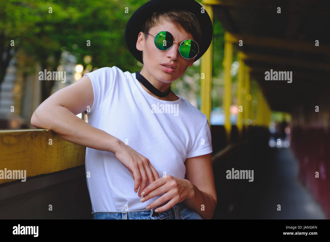 Close Up Portrait Of Female Hipster With Natural Makeup And Short