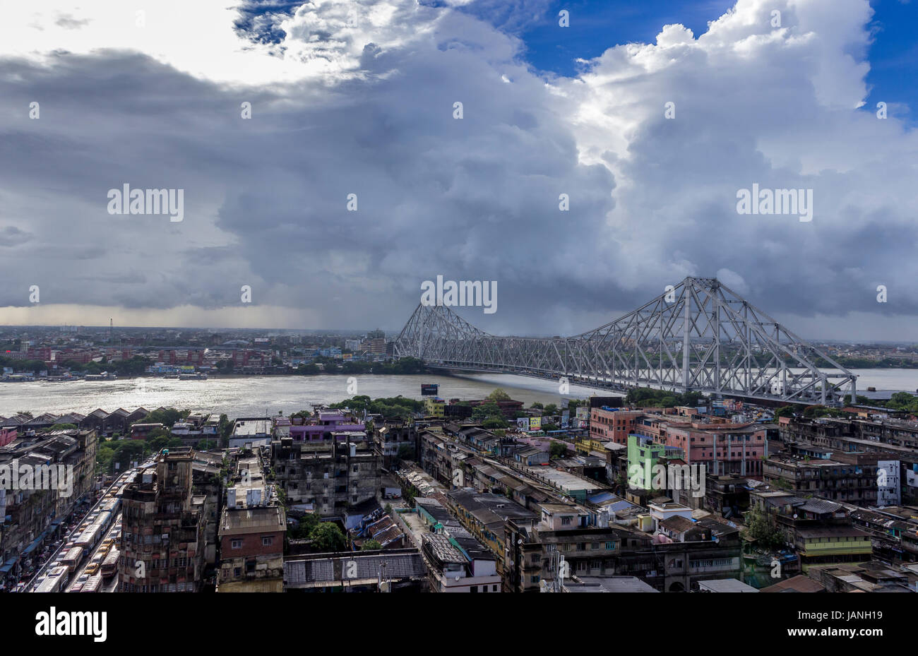 Cloudscape and Howrah Bridge, Kolkata. Stock Photo