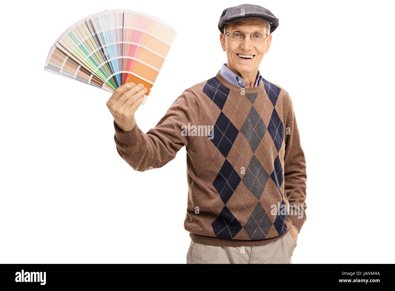 Elderly man holding a color swatch and looking at the camera isolated on white background Stock Photo