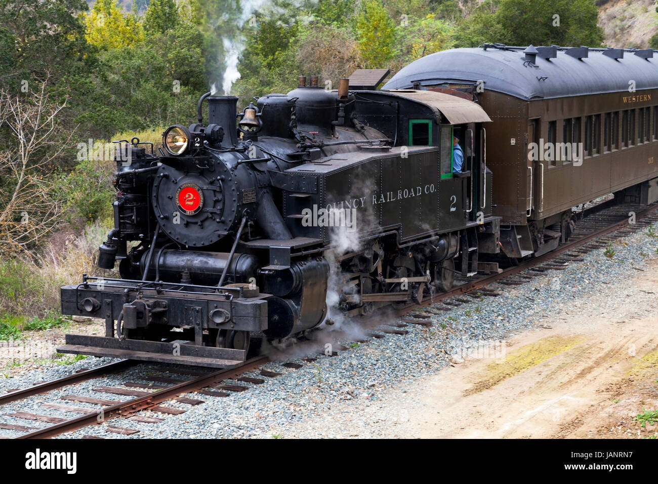 Quincy Railroad No. 2 pulls a passenger train through Niles Canyon for the Niles Canyon Railway. Built in 1924 by ALCO in Schenectady, NY, the Quincy  Stock Photo
