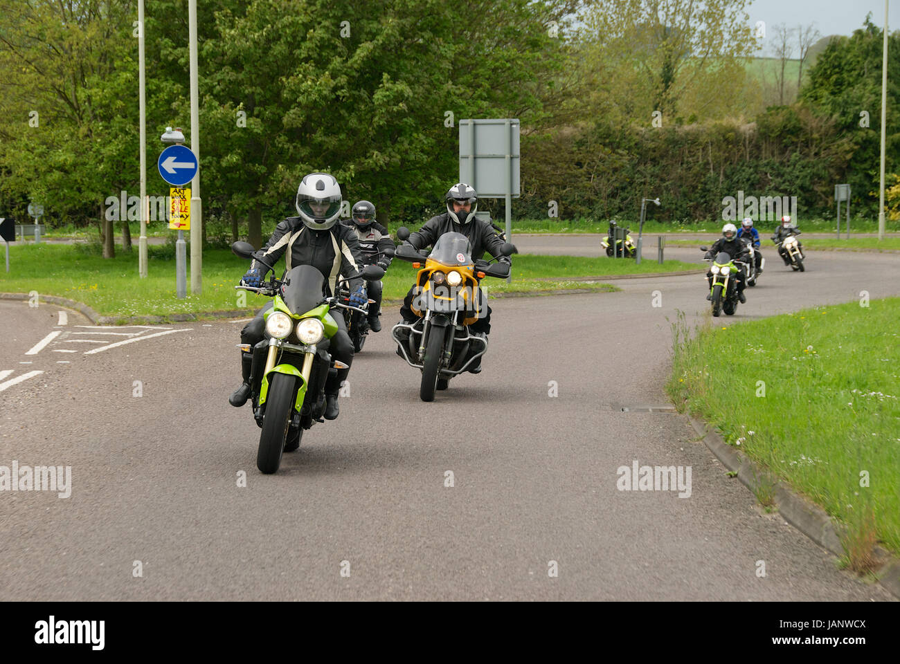 Group of motorcycles at speed on the highway with motion blur Stock