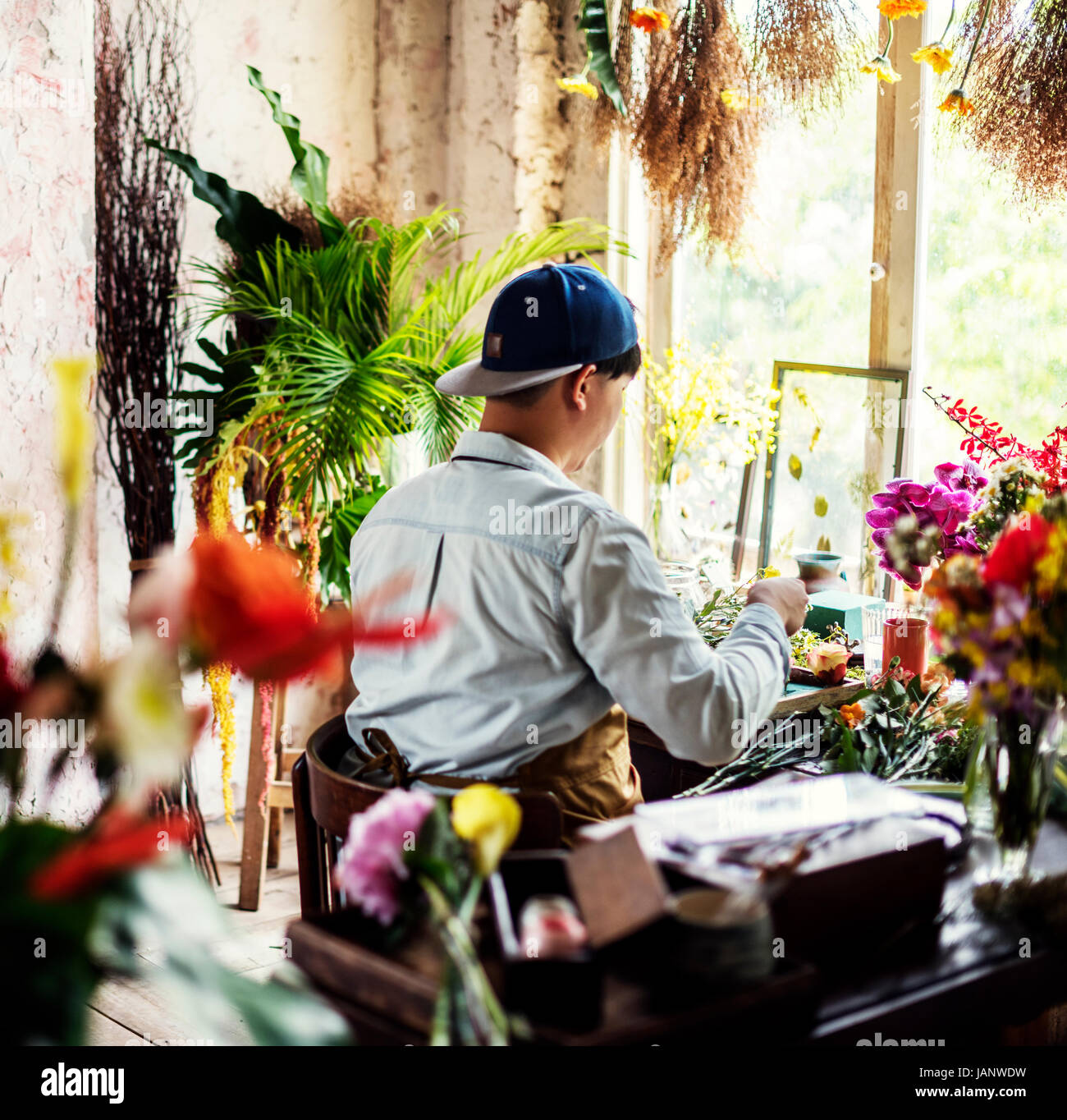 Flower shop business owner working service Stock Photo Alamy