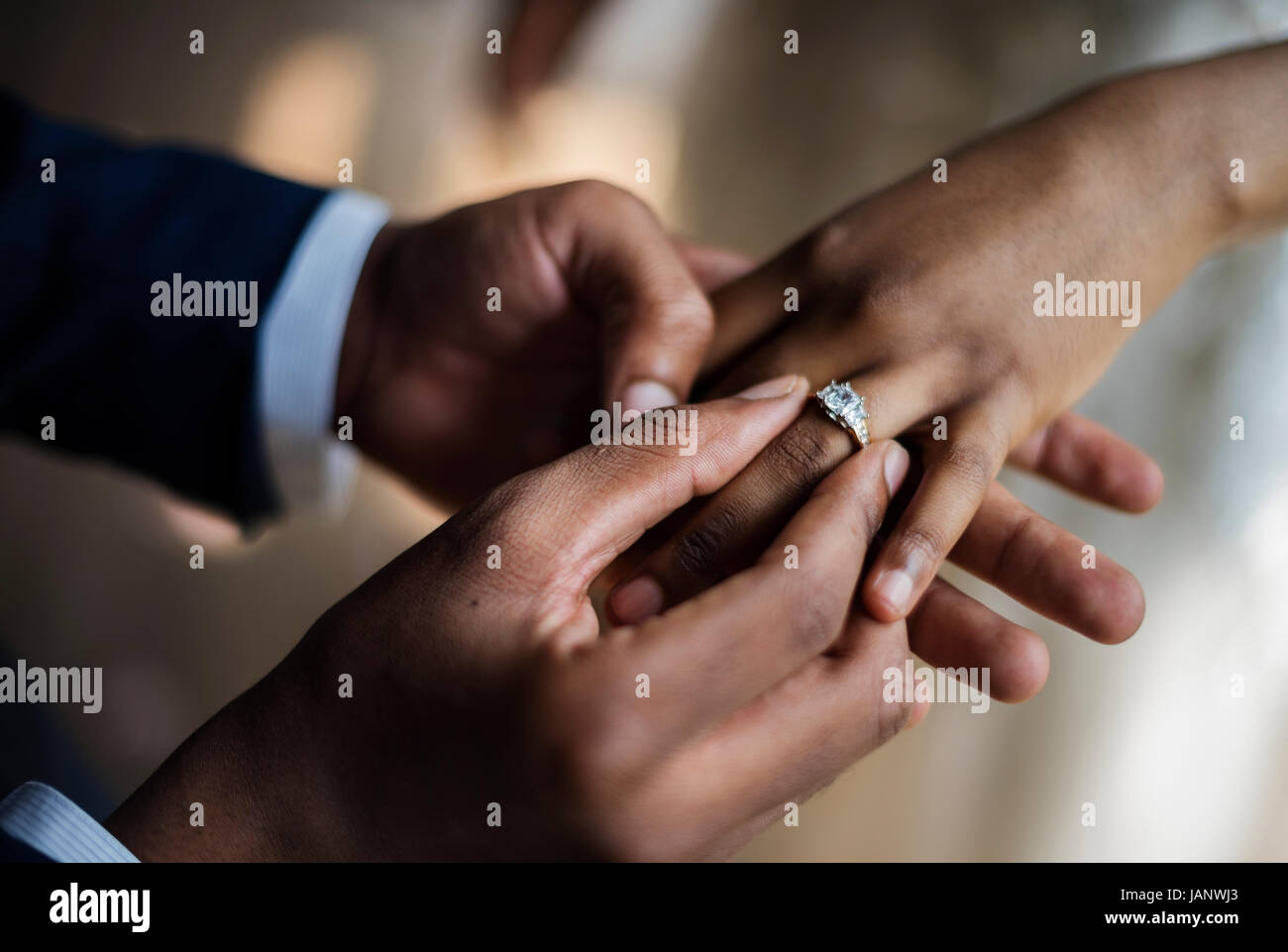 Groom Put on Wedding Ring Bride Hand Stock Photo Alamy