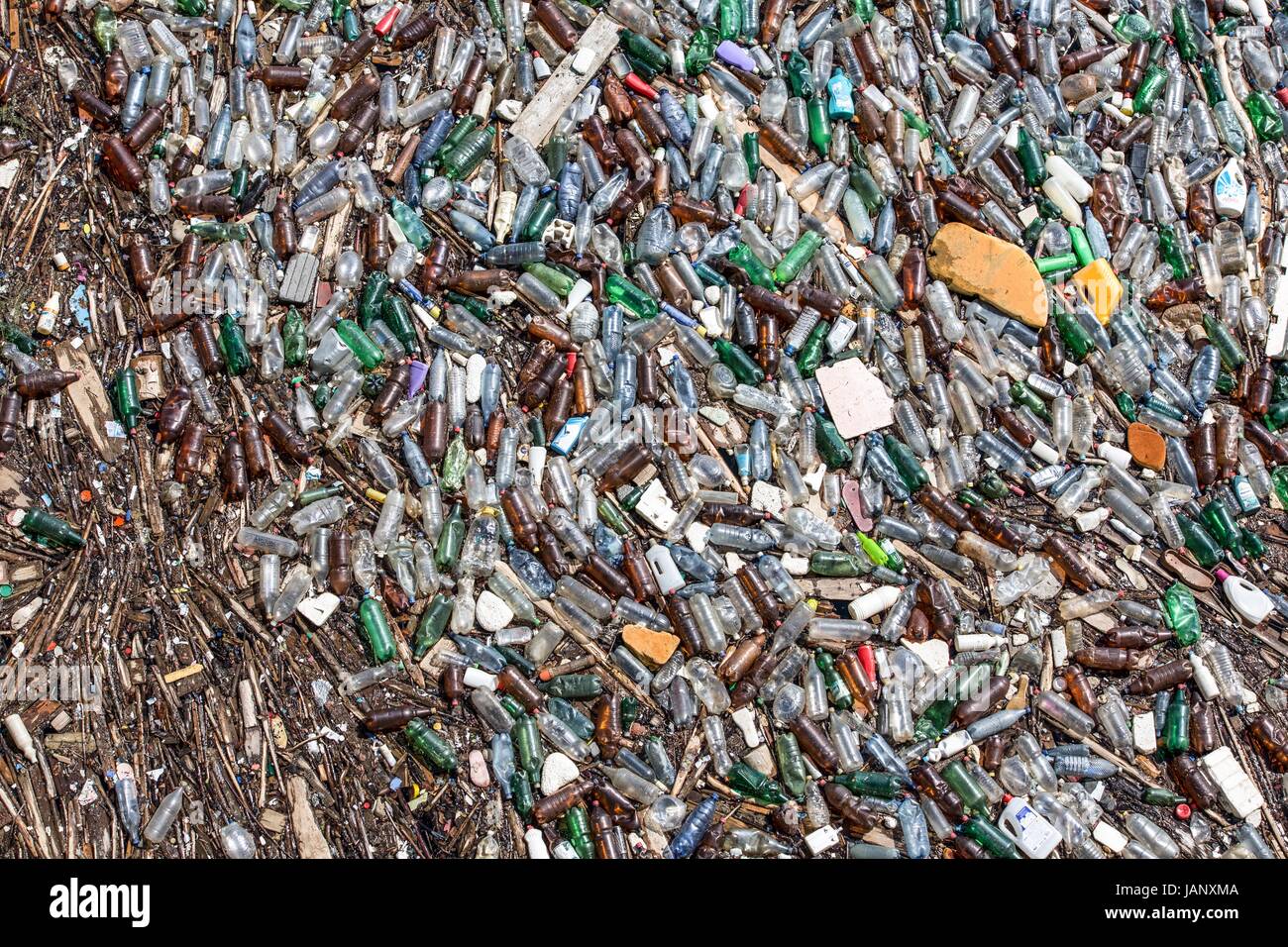 A layer of garbage, litter, rubbish, waste or plastic bottles