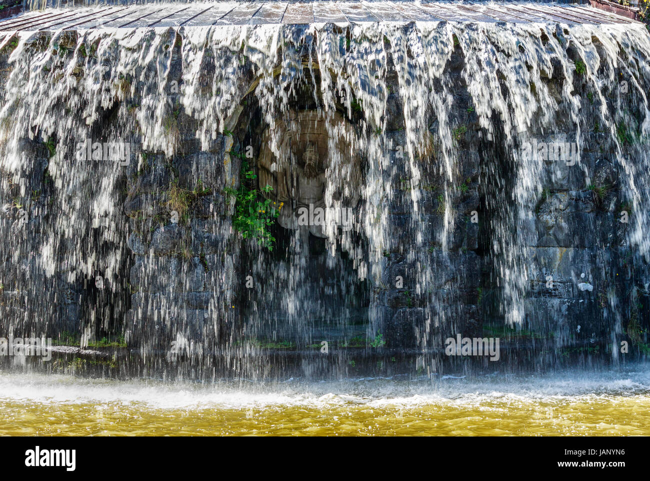 Gigantic water cascades during water features in the Wilhelmshoehe mountain park in Kassel, Germany Stock Photo