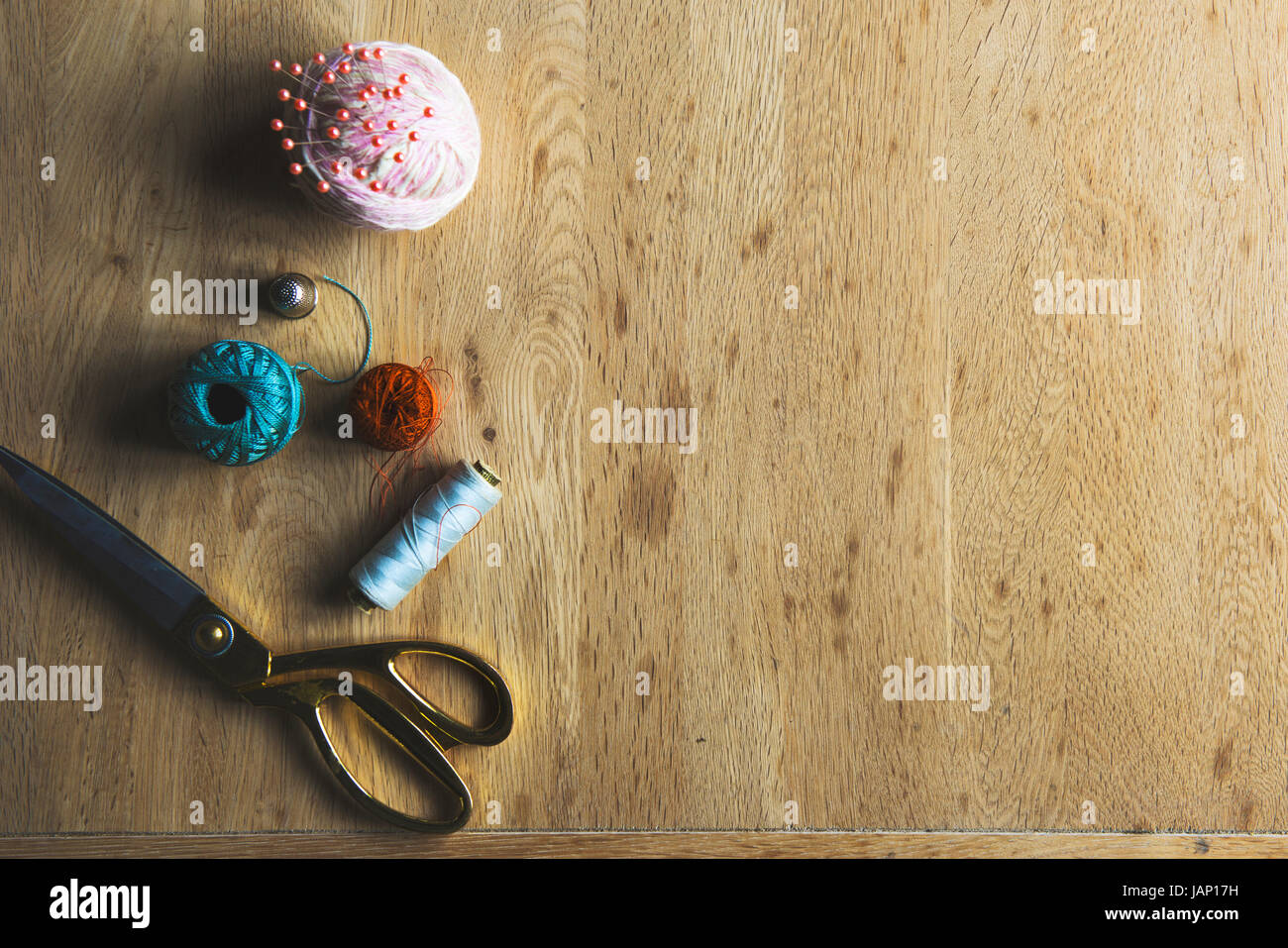 Needle cotton yarn sewing thread fabric Stock Photo Alamy