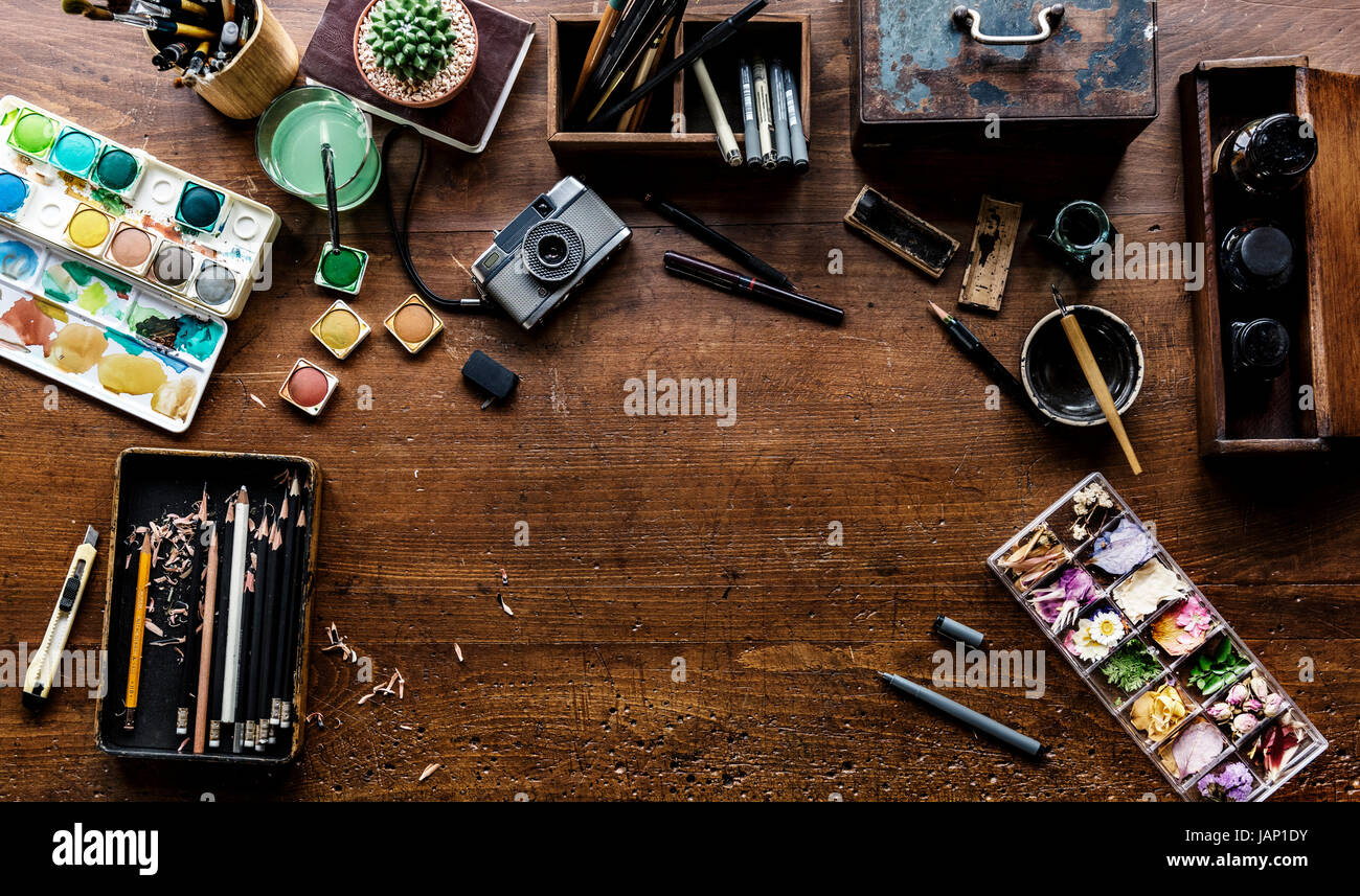 Aerial view of artistic euqipments painting tools on wooden table Stock ...