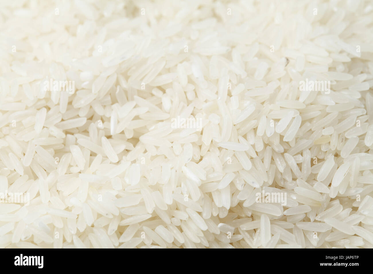 Uncooked white rice Stock Photo Alamy